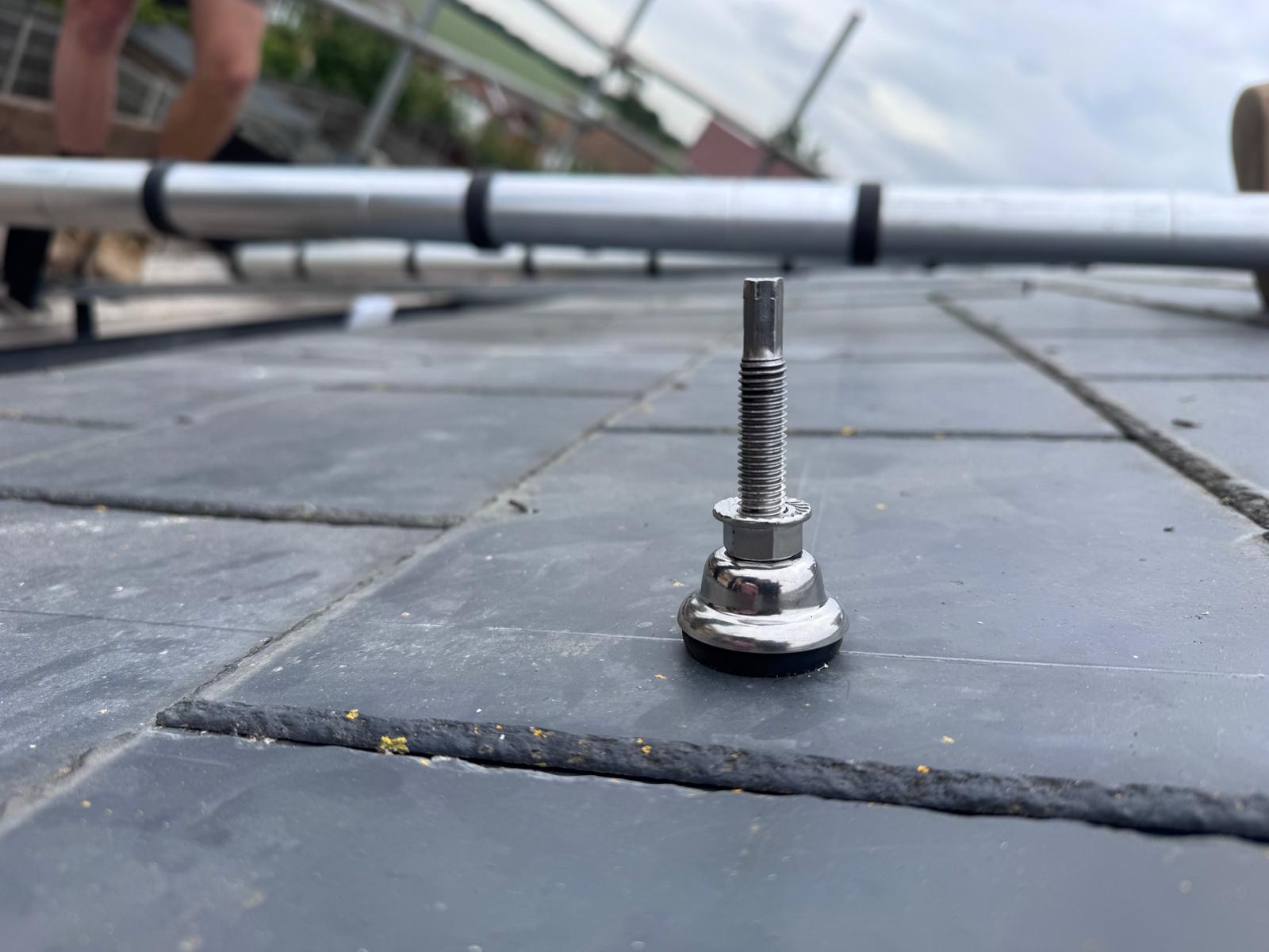 SolVe Mount stud installed on composite slate roof in Ipswich — no tiles removed, IPX8 rated watertight seal