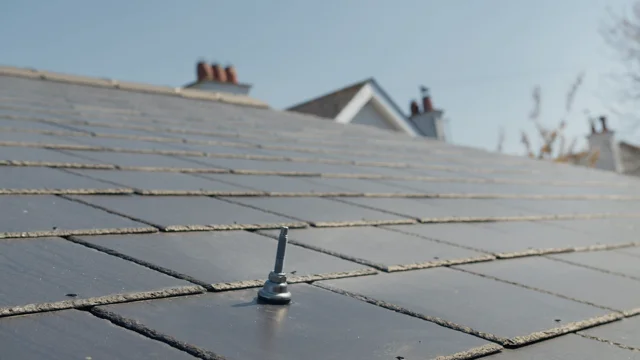 Fixing the SolVe Mount into the rafter through Cambrian interlocking slate